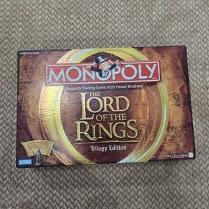 Monopoly: The Lord of the Rings Trilogy Edition Board Game - Gold, Brown